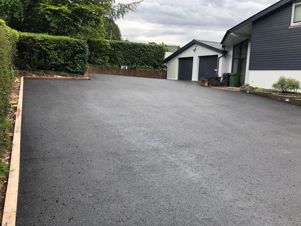 This is a photo of a asphalt driveway which is in the process of being installed by Boonah Asphalt & Bitumen Surfacing